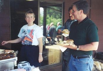 Host Gayle Thieman serving up the food.