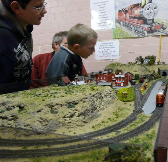 Children playing with the Orsnow layout