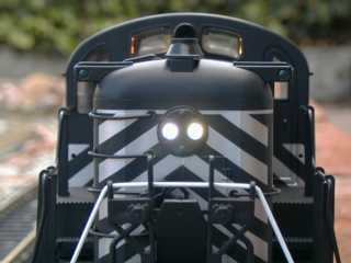 center cab with one painted headlight