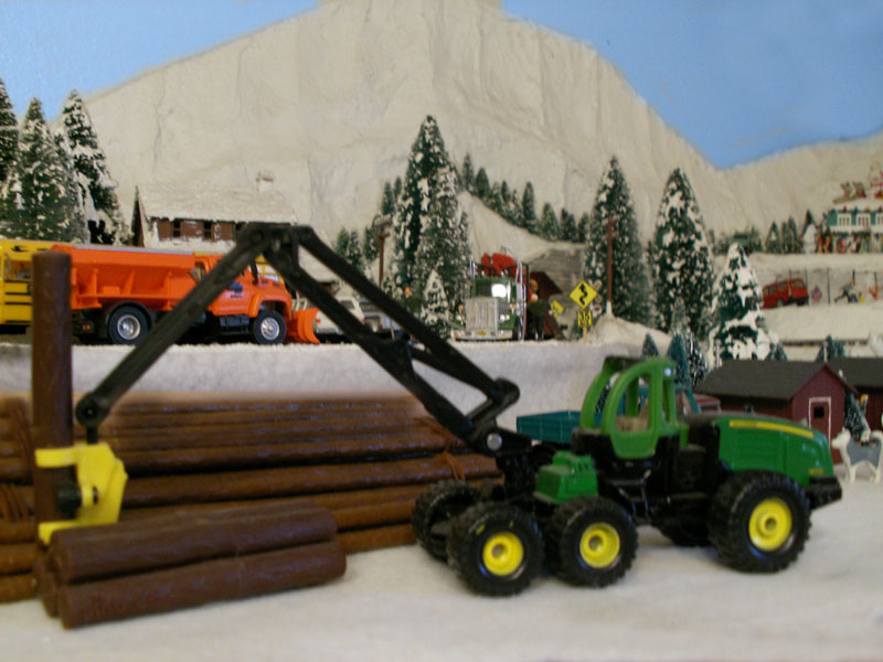 John Deer timber harvester
