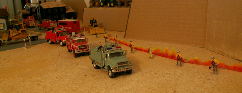 The wildfire streatches across the foothills