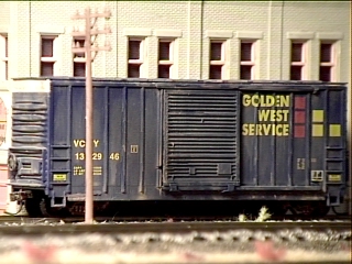 Weathered boxcar gets loaded with sportswear