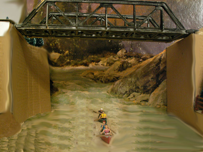 Canoes coming down Wolf Creek into Wolf Lake