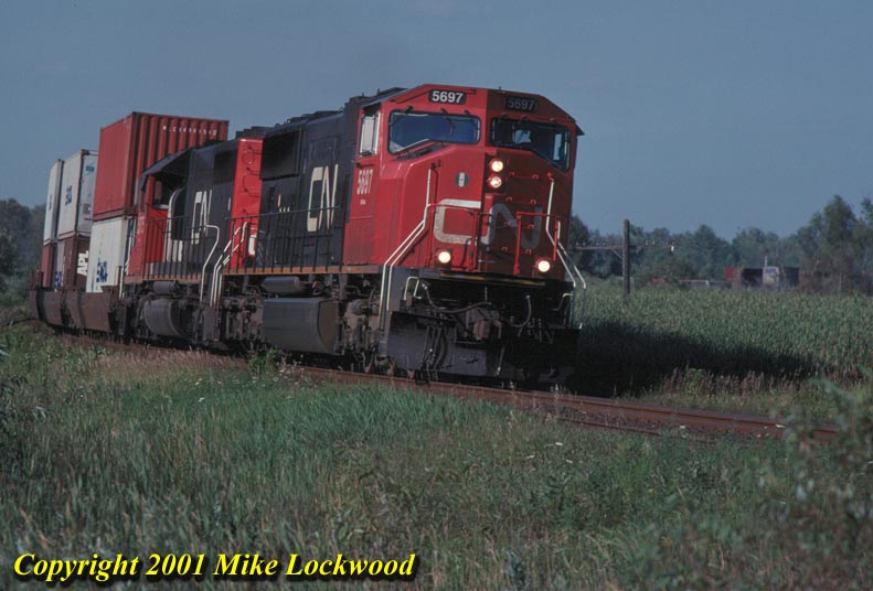 CN 5697 and 5375 on #170 Cedarbre Aug.16, 1998 @ 1717