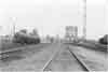 Looking east near Jane Street. Diesel fuel storage tanks behind tank cars