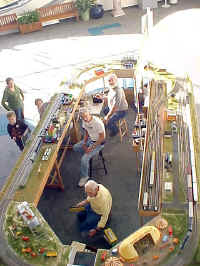 Chuck Smith, George Cole and Dave Daniel (front to rear) are manning the RASG modular layout.