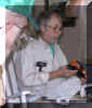 Bill Weed examines a car.