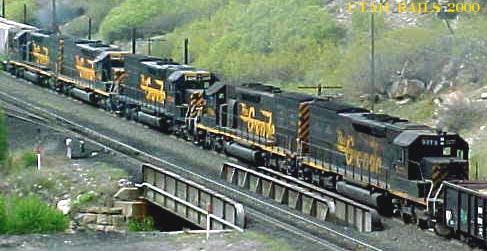 SD40T-2's helping MDVRO up the hill west of Helper, UT May, 2000.